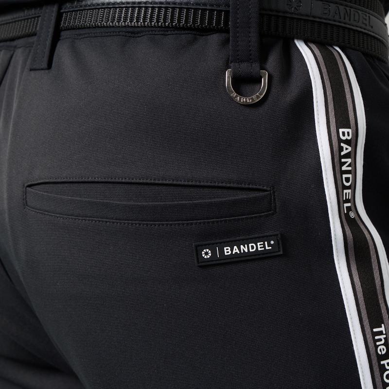 BANDEL GOLF コンセプトノーツテーピングテーパードパンツ BLACK