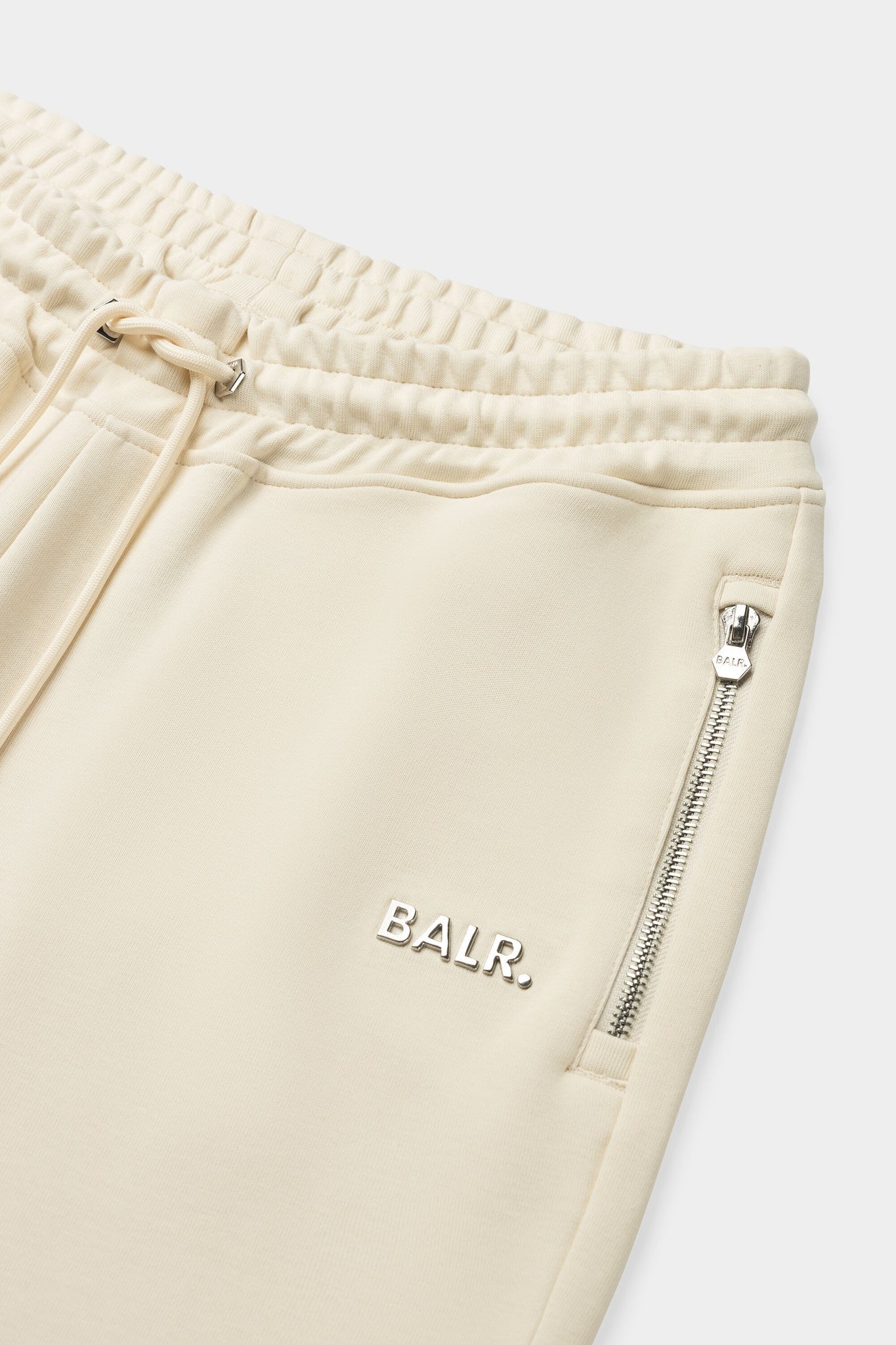 Q-Series Regular Fit Jogger B1411.1106 スウェットパンツ ジップ付きポケット ストレッチ 吸湿性 耐久性 / White Swan